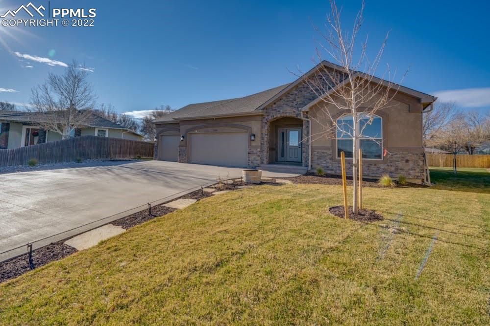119 Rocchio Drive Florence, CO 81226 - Photo 41 of 48 a front view of a house with a yard