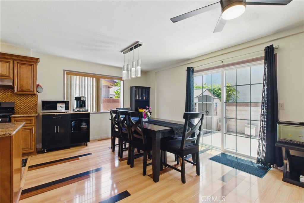 302 East 213th Street Carson, CA 90745 - Photo 12 of 40 a view of a dining room with furniture and window