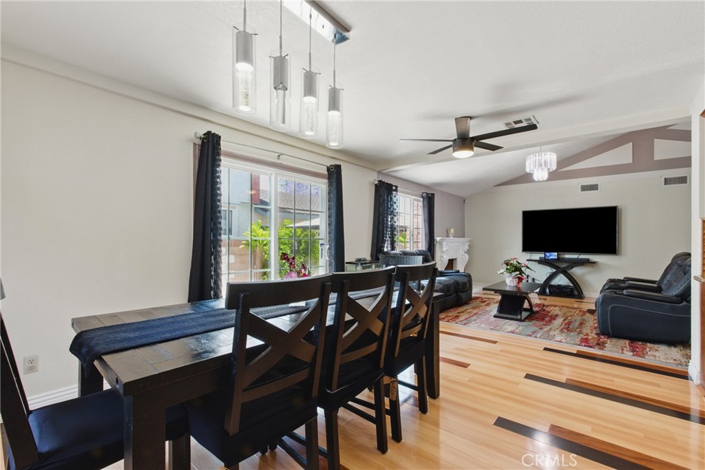 302 East 213th Street Carson, CA 90745 - Photo 13 of 40 a view of a dining room with furniture window and wooden floor