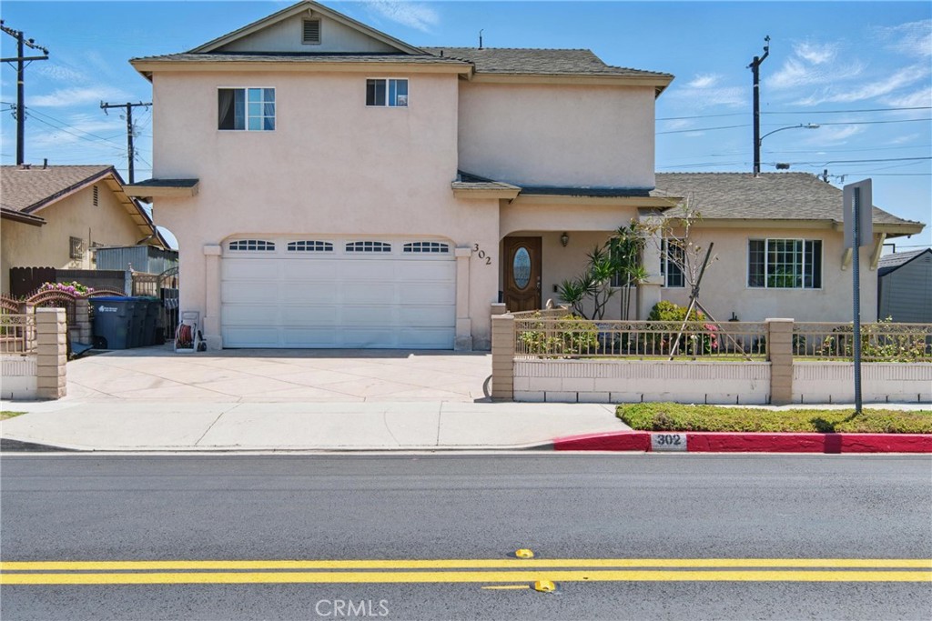 302 East 213th Street Carson, CA 90745 - Photo 39 of 40 a view of a house with swimming pool and sitting area