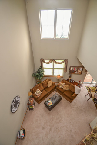 269 Grand Ridge Road, Unit 269 St. Charles, IL 60175 - Photo 4 of 25 a room with gym equipment