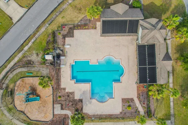 a view of a kitchen with microwave and cabinets