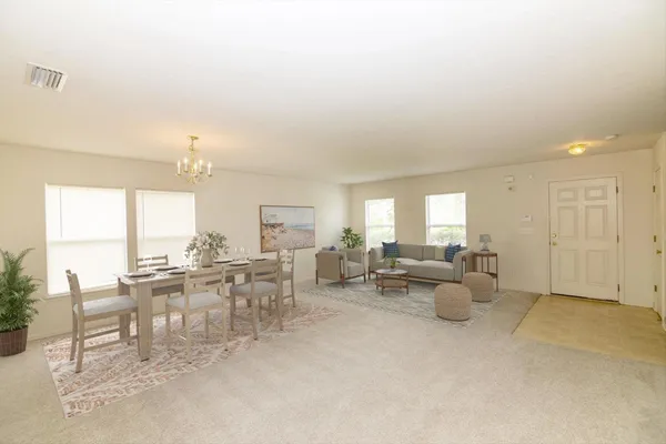 a view of a kitchen with a sink and cabinets
