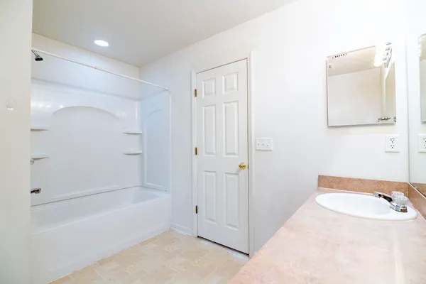 an aerial view of multiple houses with yard