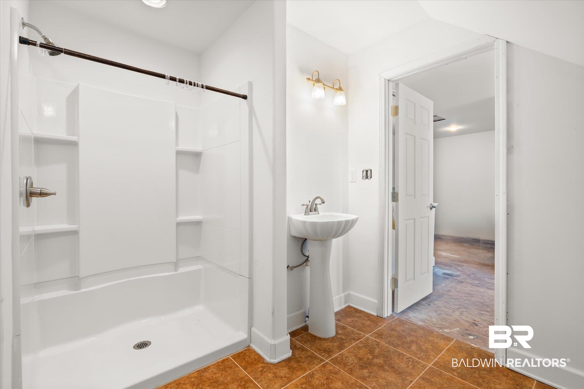 15635 County Road 83 Elberta, AL 36530 - Photo 27 of 54 Bathroom with tile patterned floors, sink, and walk in shower