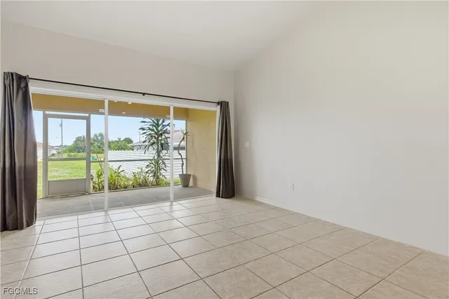 a view of an empty room and window