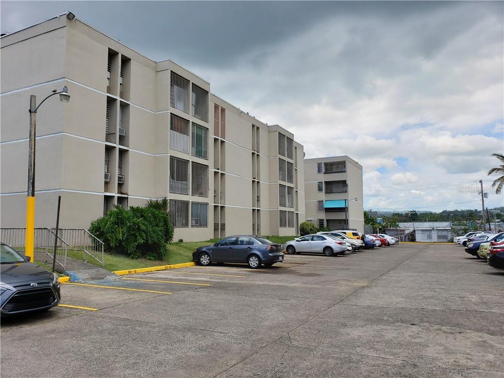 a cars parked in front of a building