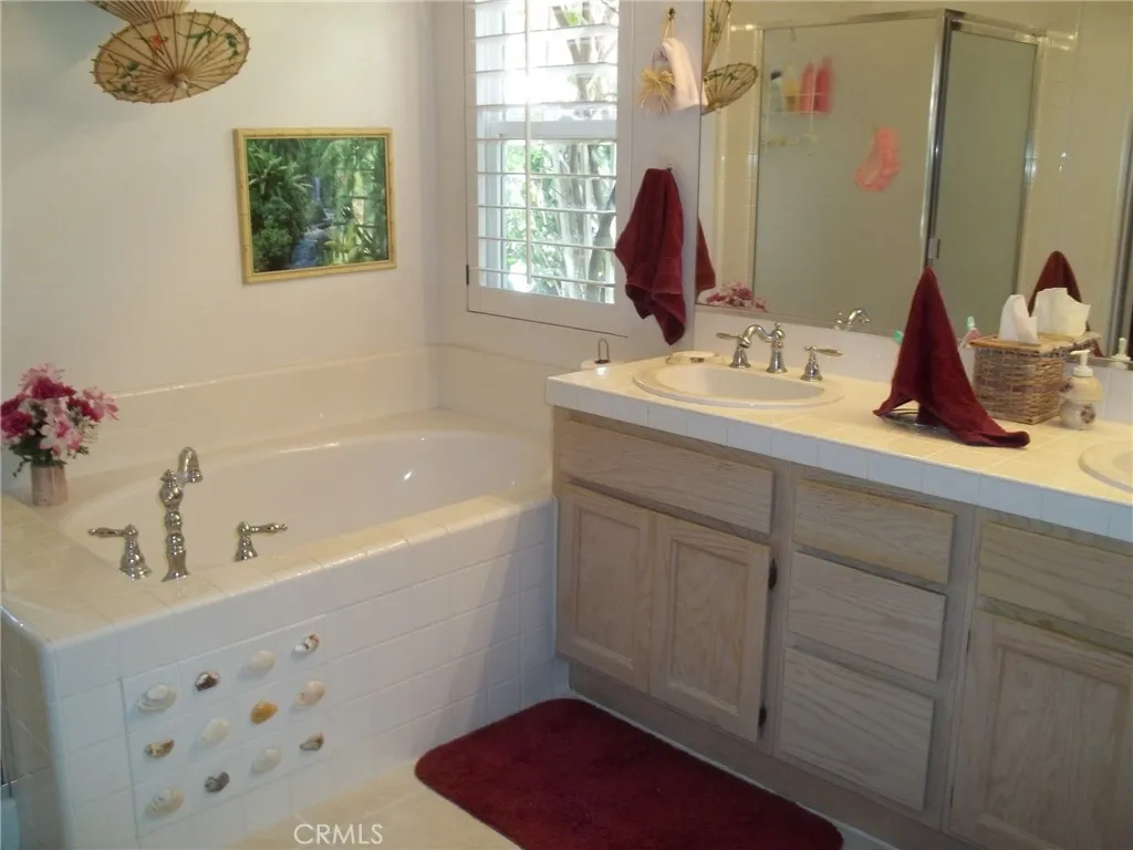 1647 Shire Avenue Oceanside, CA 92057 - Photo 11 of 15 a bathroom with a sink and a bathtub