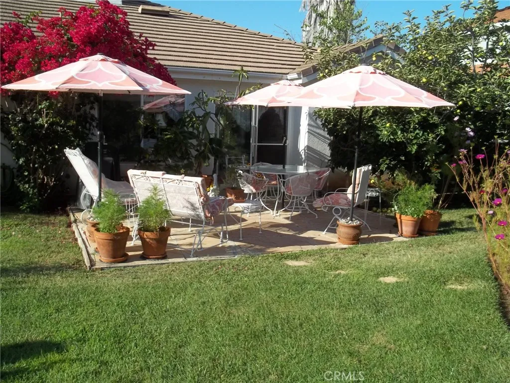 1647 Shire Avenue Oceanside, CA 92057 - Photo 2 of 15 a view of a house with backyard sitting area and garden