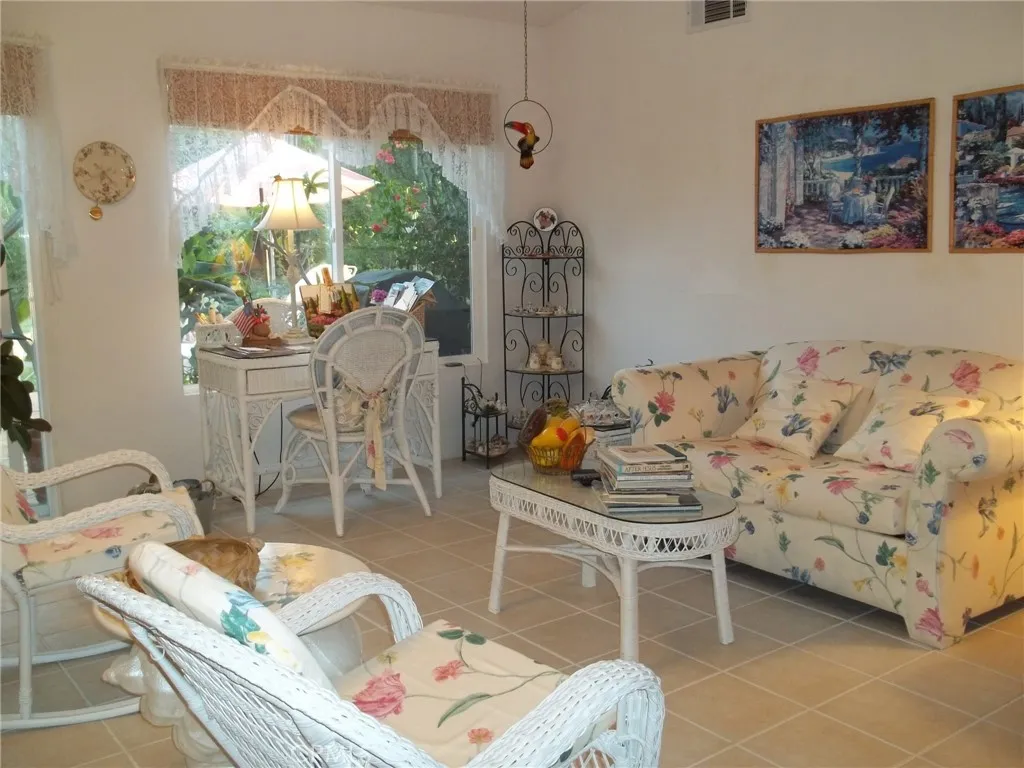 1647 Shire Avenue Oceanside, CA 92057 - Photo 6 of 15 a living room with furniture and a large window