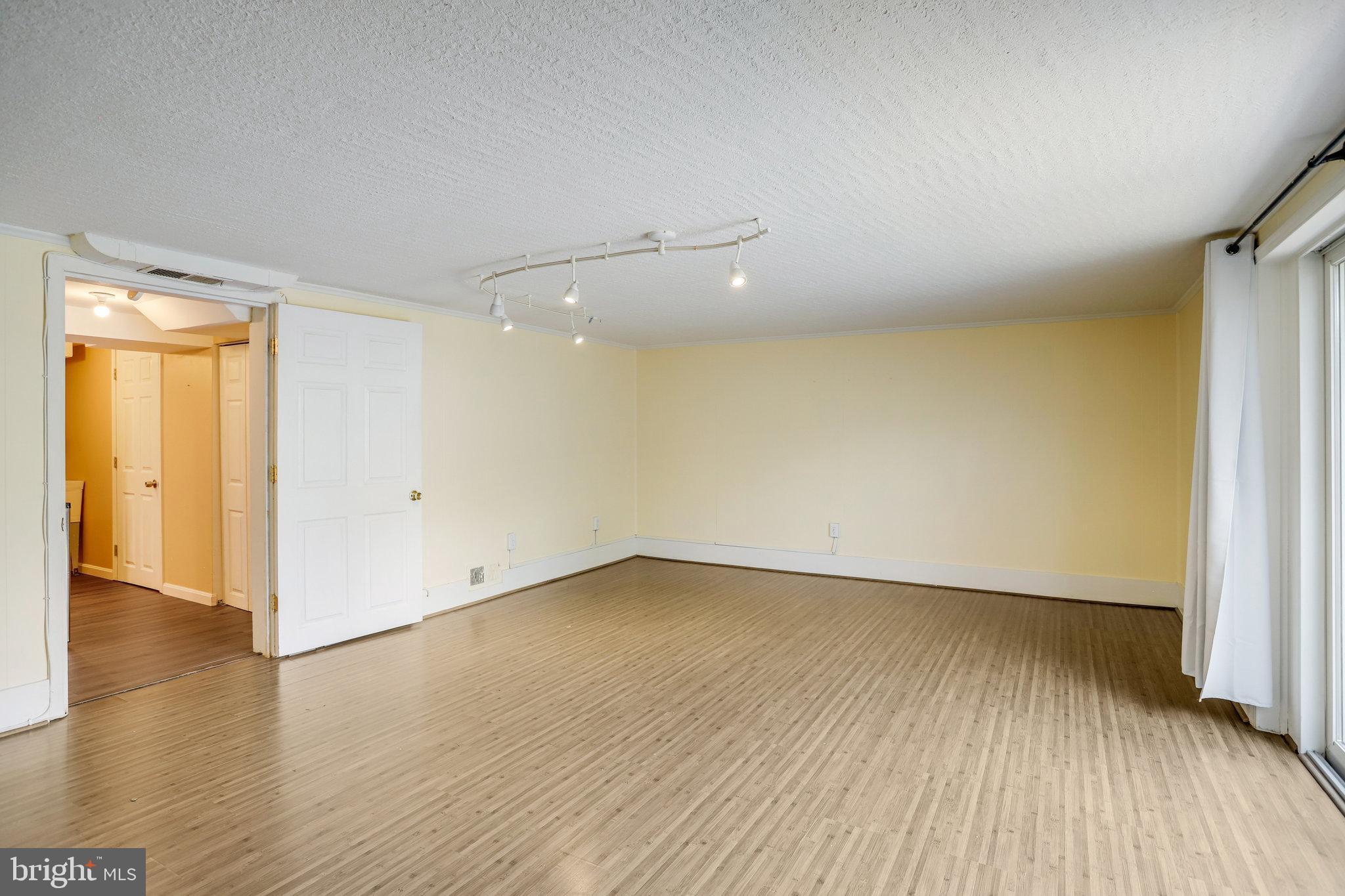 5370 Pooks Hill Road, Unit 30153 Bethesda, MD 20814 - Photo 14 of 28 Family Room In Finished Basement