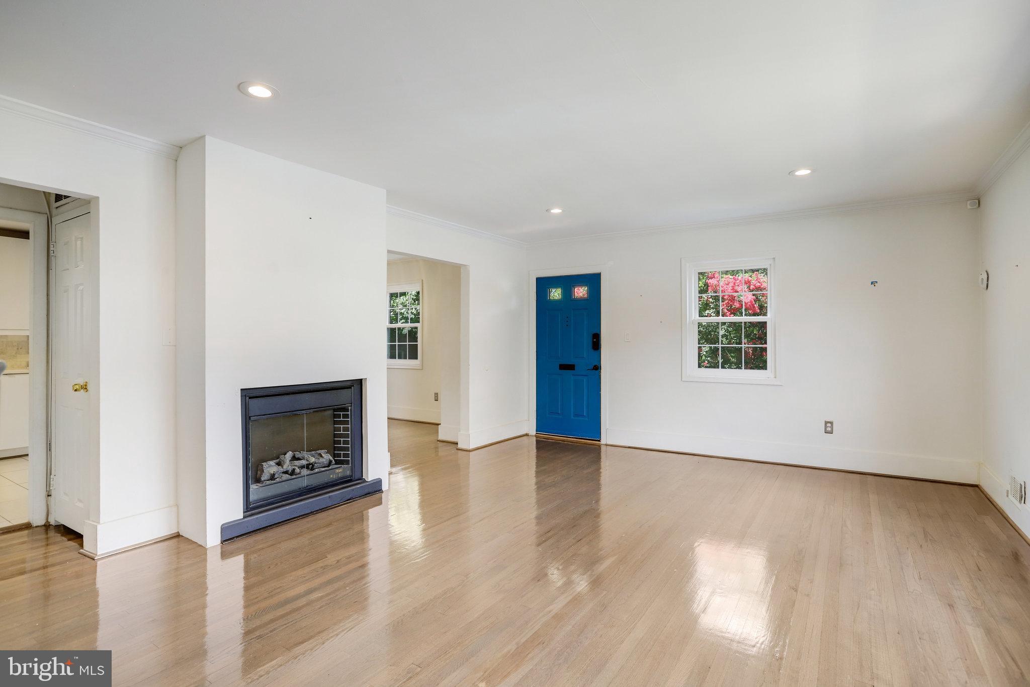 5370 Pooks Hill Road, Unit 30153 Bethesda, MD 20814 - Photo 5 of 28 Front Door and Fireplace