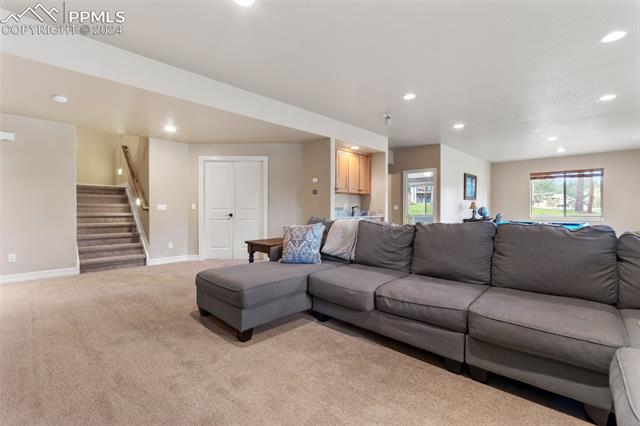 7880 Monarch Road Larkspur, CO 80118 - Photo 21 of 25 View of carpeted living room