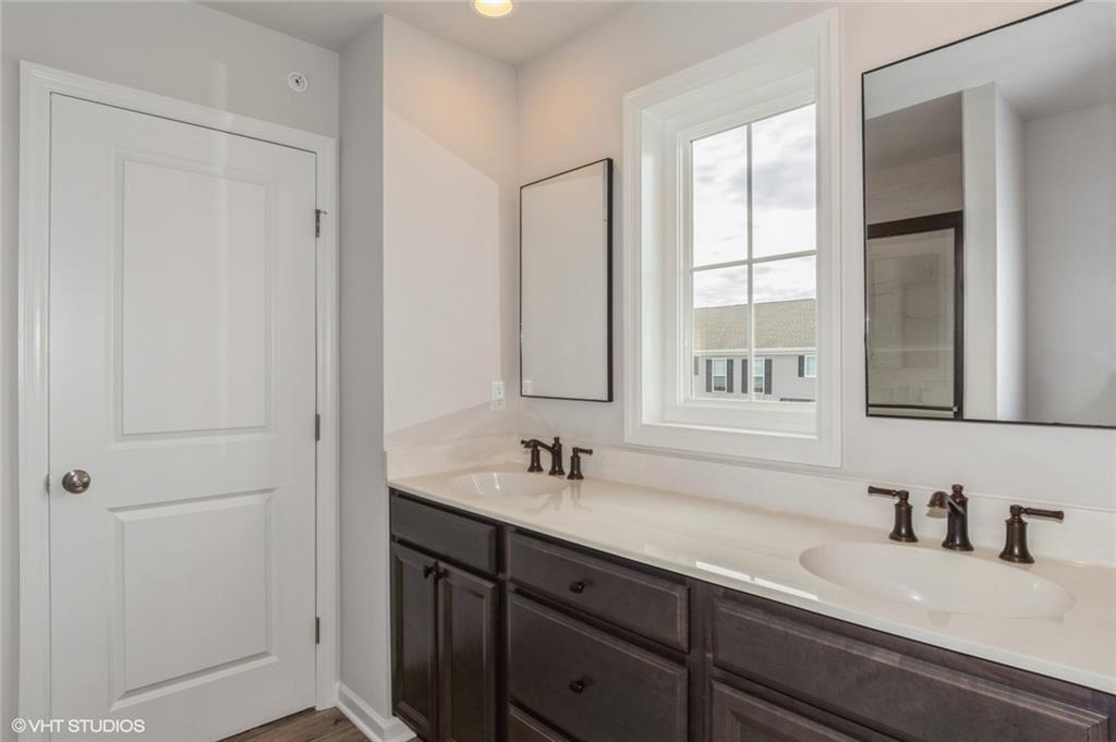 210 Gress Road Cranberry Township, PA 16066 - Photo 15 of 38 a bathroom with double sink and a mirror
