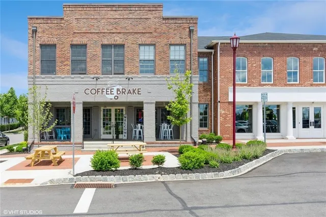 a view of a city with an ocean view