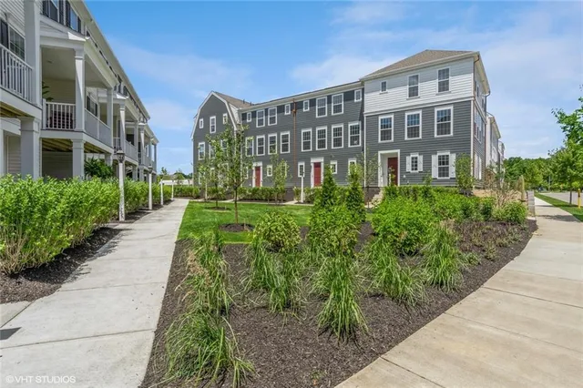 a view of a balcony with chairs