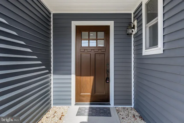 a view of a door and a window
