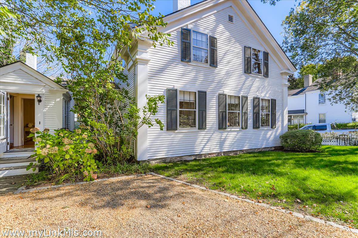 27 Spring Street Vineyard Haven, MA 02568 - Photo 50 of 58 a view of a house with a yard and plants