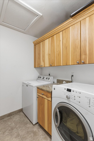 6237 West 4600th Street South Hooper, UT 84315 - Photo 23 of 48 Laundry room featuring cabinet space and separate washer and dryer