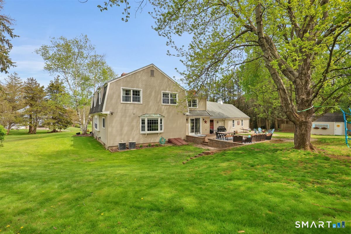 72 Old Post Road Wethersfield, CT 06109 - Photo 34 of 40 a view of a house with a yard