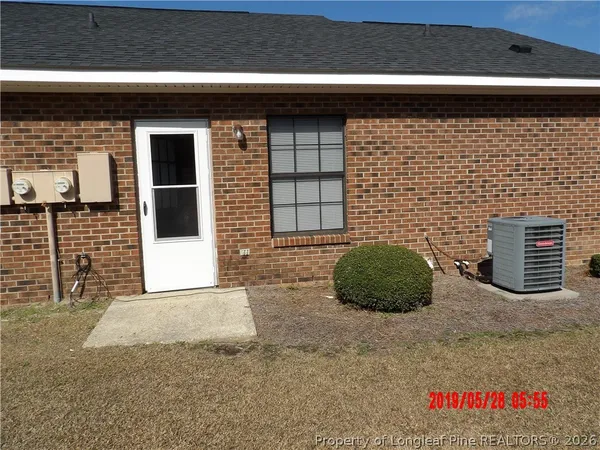 a view of ocean with a yard