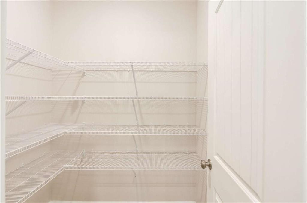 6342 Pine Ridge Point Lula, GA 30554 - Photo 12 of 27 a view of a room with racks on the wall