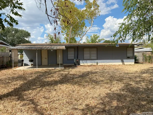 a front view of a house with a garage