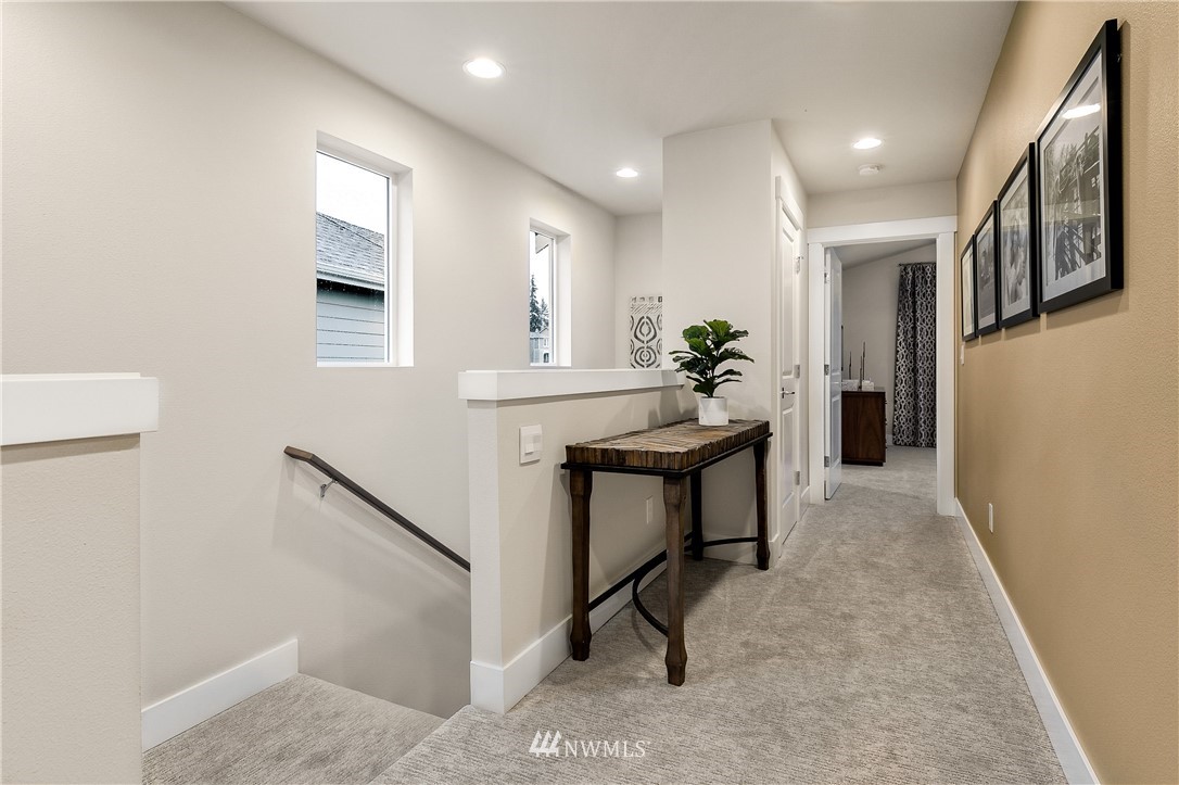 23118 88th Avenue West, Unit 3 Edmonds, WA 98026 - Photo 20 of 31 a view of a hallway with seating area