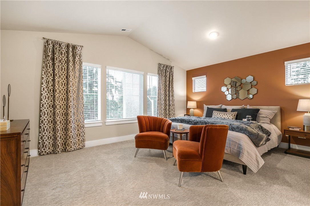 23118 88th Avenue West, Unit 3 Edmonds, WA 98026 - Photo 25 of 31 a bedroom with furniture and a large window