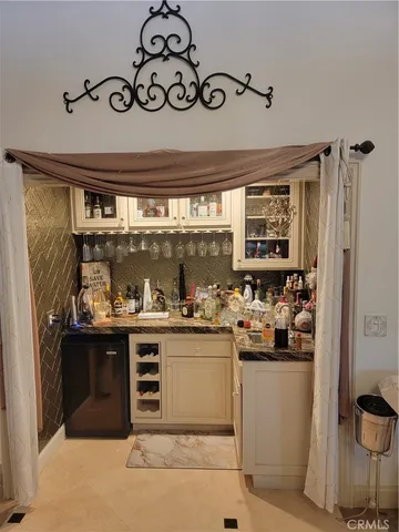 a bathroom with a sink mirror toilet and bathtub
