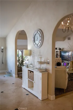 a bathroom with a toilet and a mirror