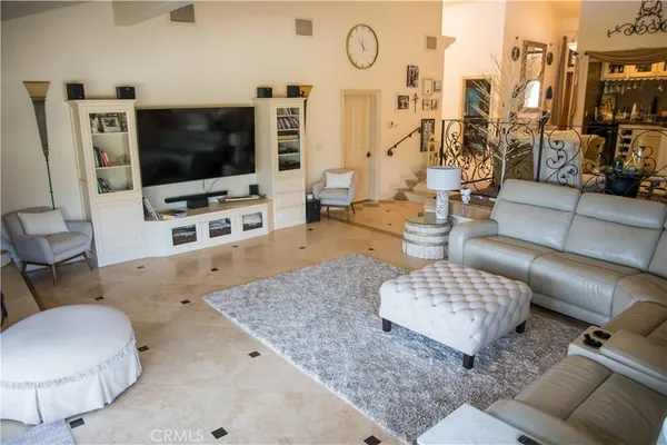 a view of a patio with swimming pool table and chairs