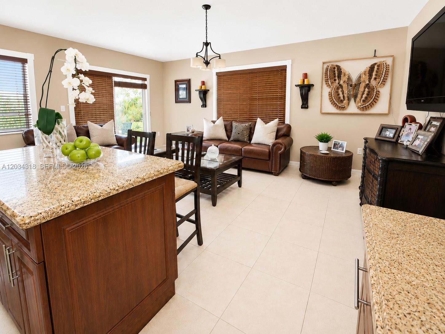 14856 Southwest 179th Street Miami, FL 33187 - Photo 14 of 33 a view of a livingroom with furniture and window