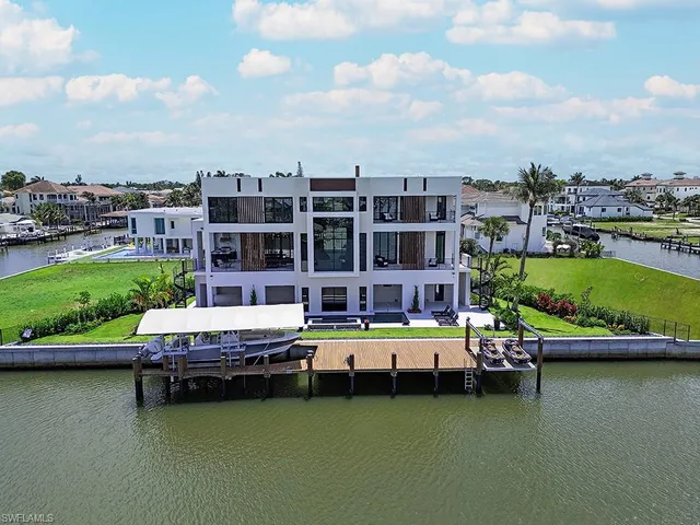 a view of a lake with a residential buildings