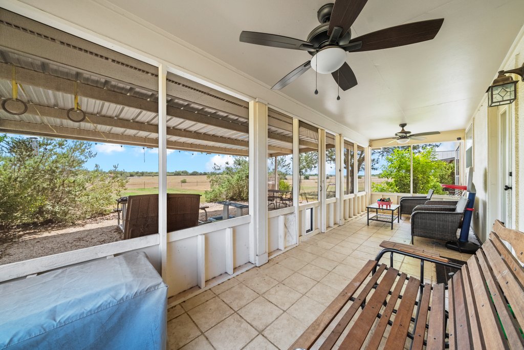 1100 Martindale Falls Road Martindale, TX 78655 - Photo 17 of 31 Sunroom featuring an outdoor living space and ceiling fan