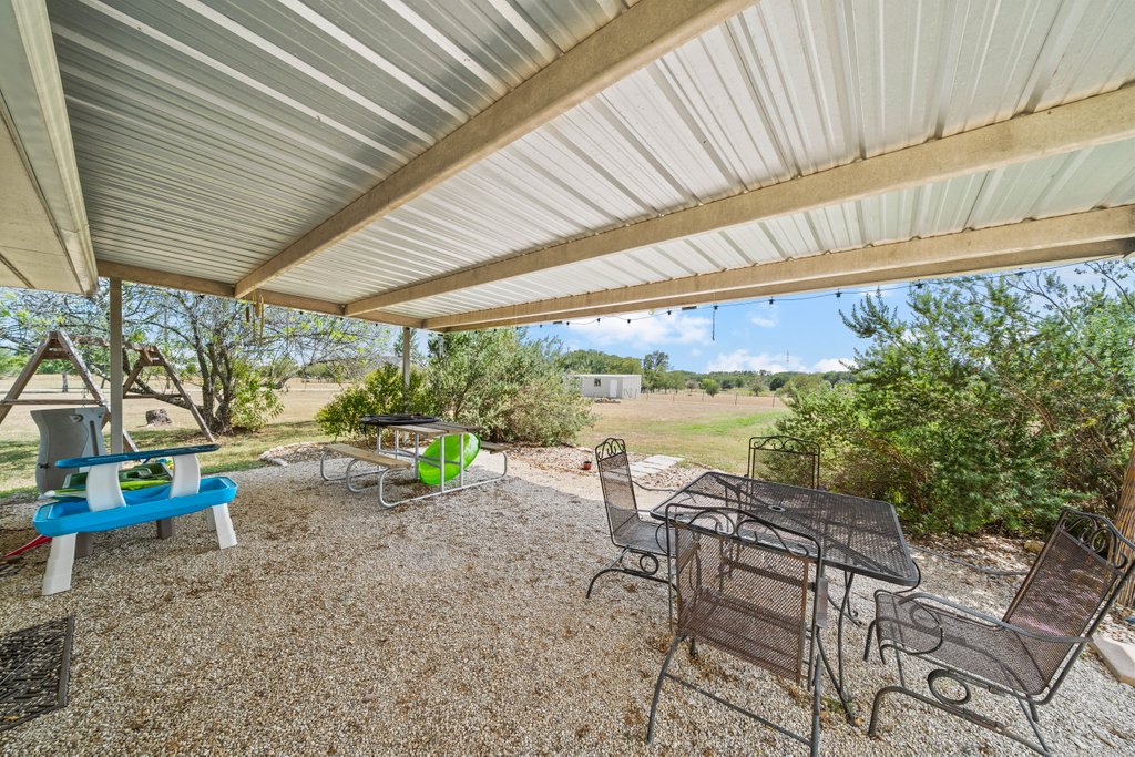 1100 Martindale Falls Road Martindale, TX 78655 - Photo 18 of 31 View of patio / terrace featuring outdoor dining area