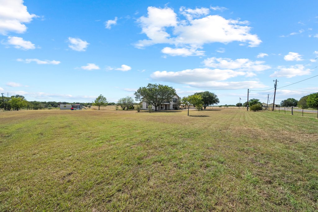 1100 Martindale Falls Road Martindale, TX 78655 - Photo 24 of 31 View of grassy yard featuring a view of countryside