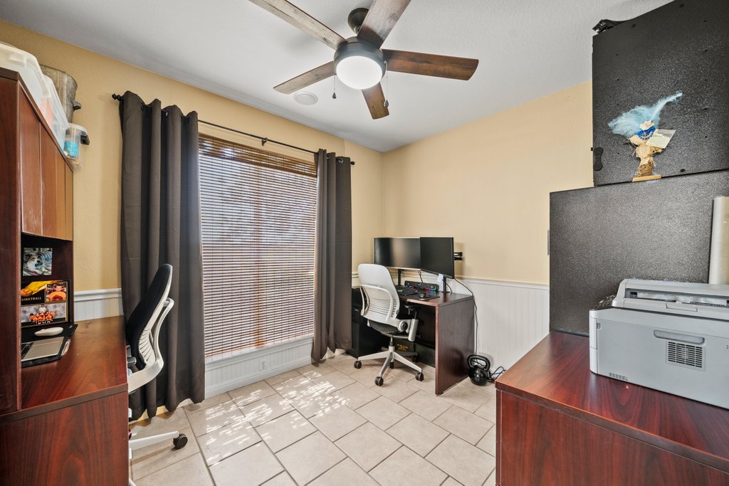 1100 Martindale Falls Road Martindale, TX 78655 - Photo 10 of 31 Office with wainscoting, light tile patterned floors, and a ceiling fan