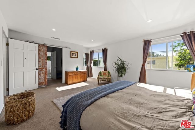 a white bath tub sitting in a bathroom