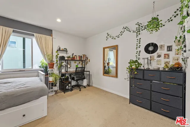 a view of a living room and utility room