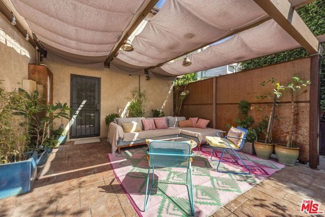 a outdoor living space with furniture and outdoor view