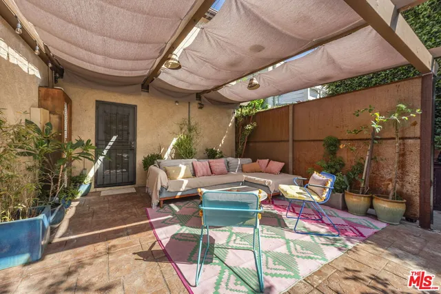a outdoor living space with furniture and outdoor view