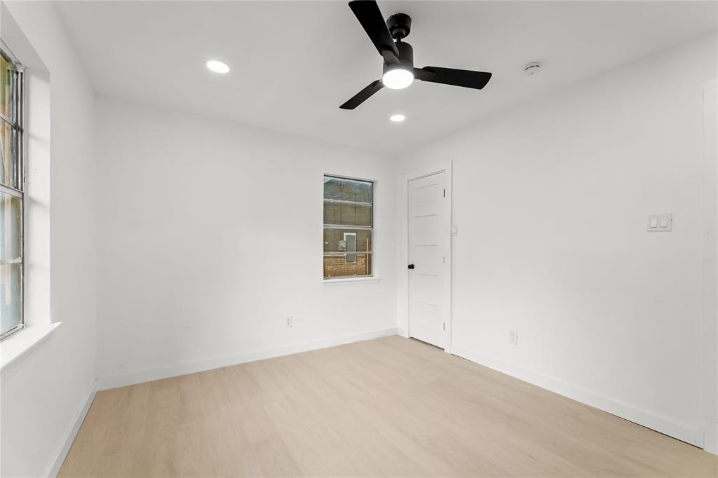 110 Hackberry Street Lancaster, TX 75146 - Photo 16 of 32 Room featuring light wood-finish flooring and white walls