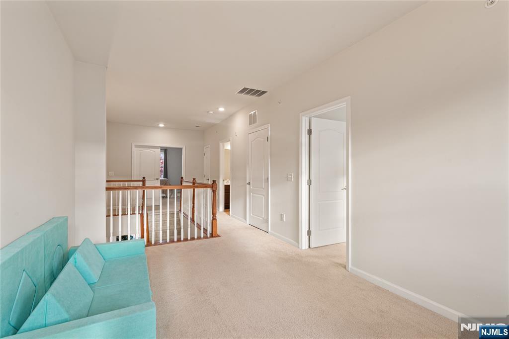 43 Wesmont Drive, Unit 1712 Wood-Ridge, NJ 07075 - Photo 18 of 35 a view of a livingroom with furniture