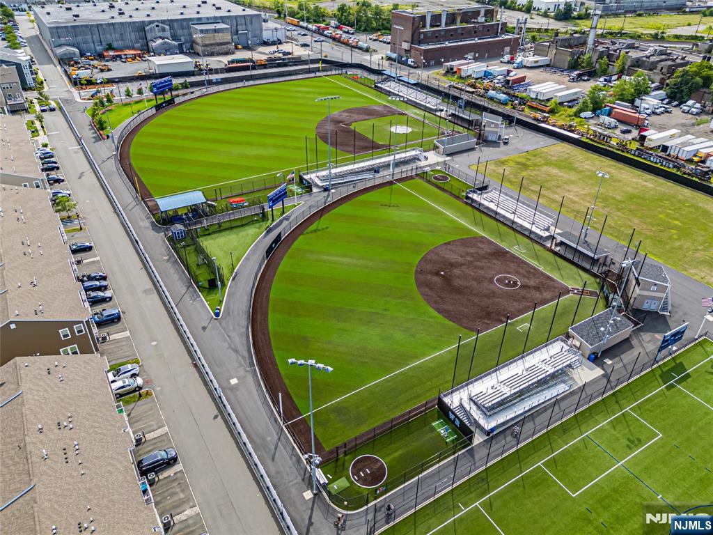 43 Wesmont Drive, Unit 1712 Wood-Ridge, NJ 07075 - Photo 31 of 35 swimming pool view with a outdoor seating space