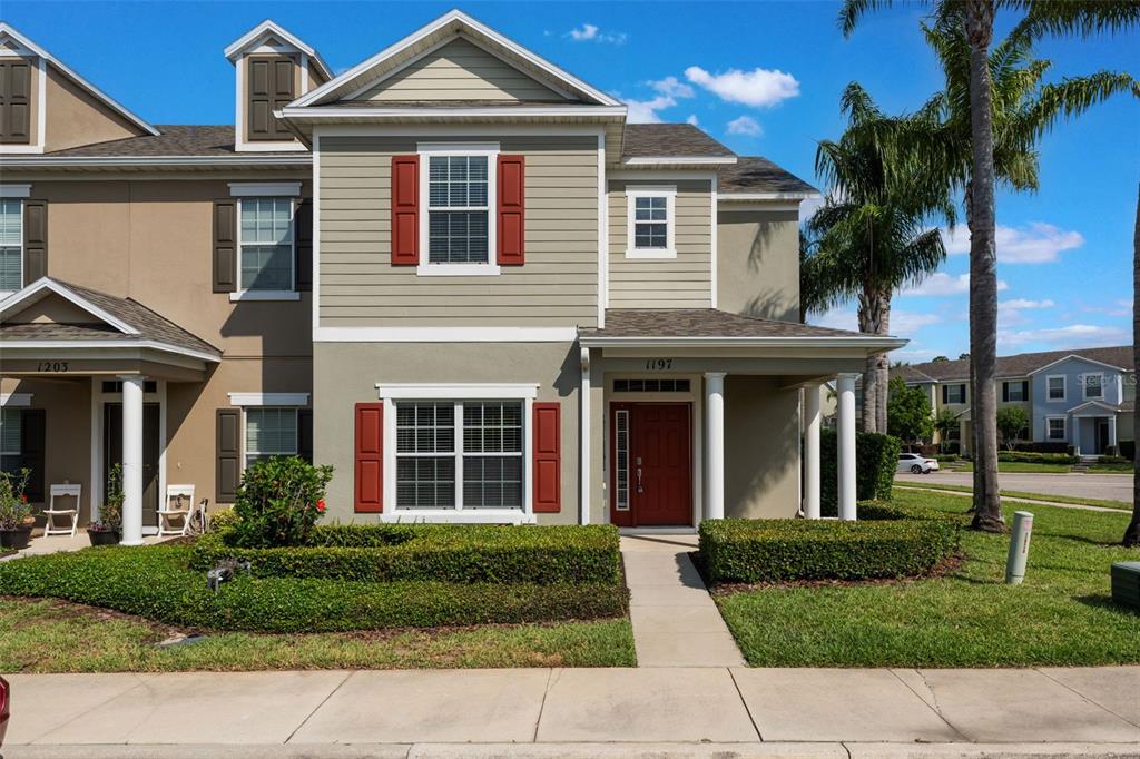 a front view of a house with a yard