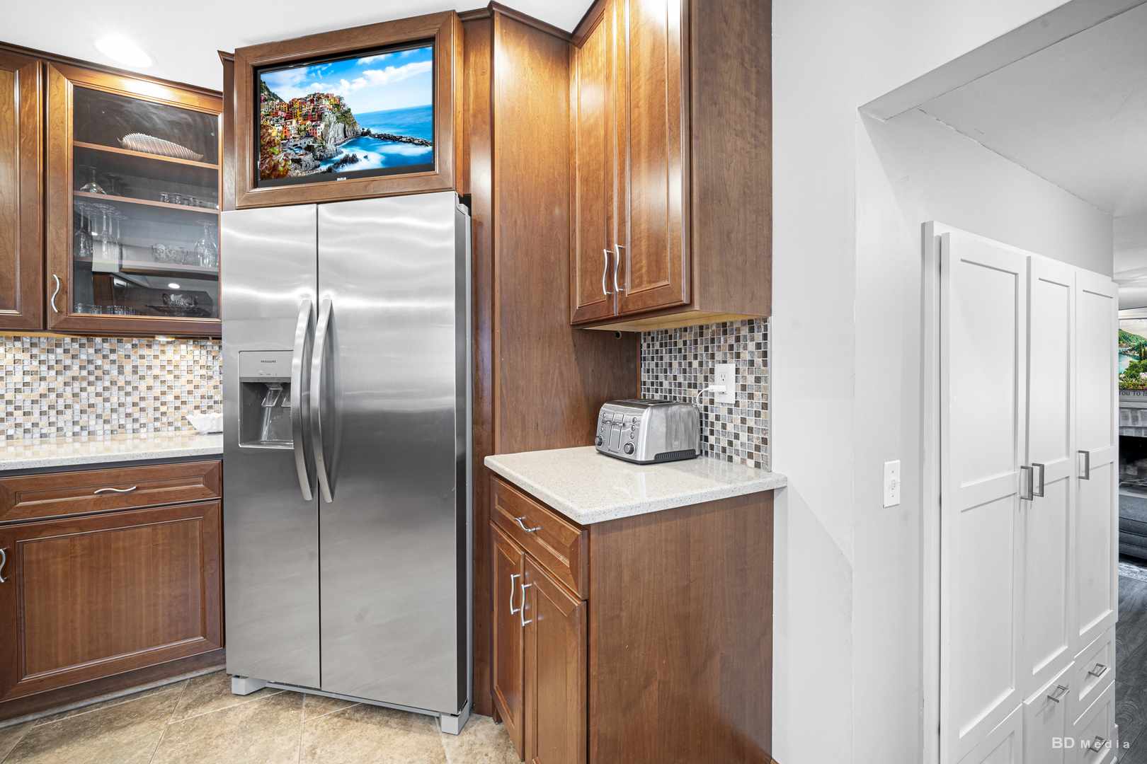 807 Maple Lane Peotone, IL 60468 - Photo 13 of 33 a kitchen with stainless steel appliances granite countertop a refrigerator and a wooden cabinets