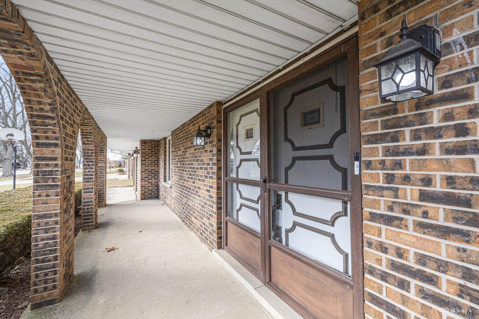 807 Maple Lane Peotone, IL 60468 - Photo 2 of 33 a view of a porch with a wooden stairs