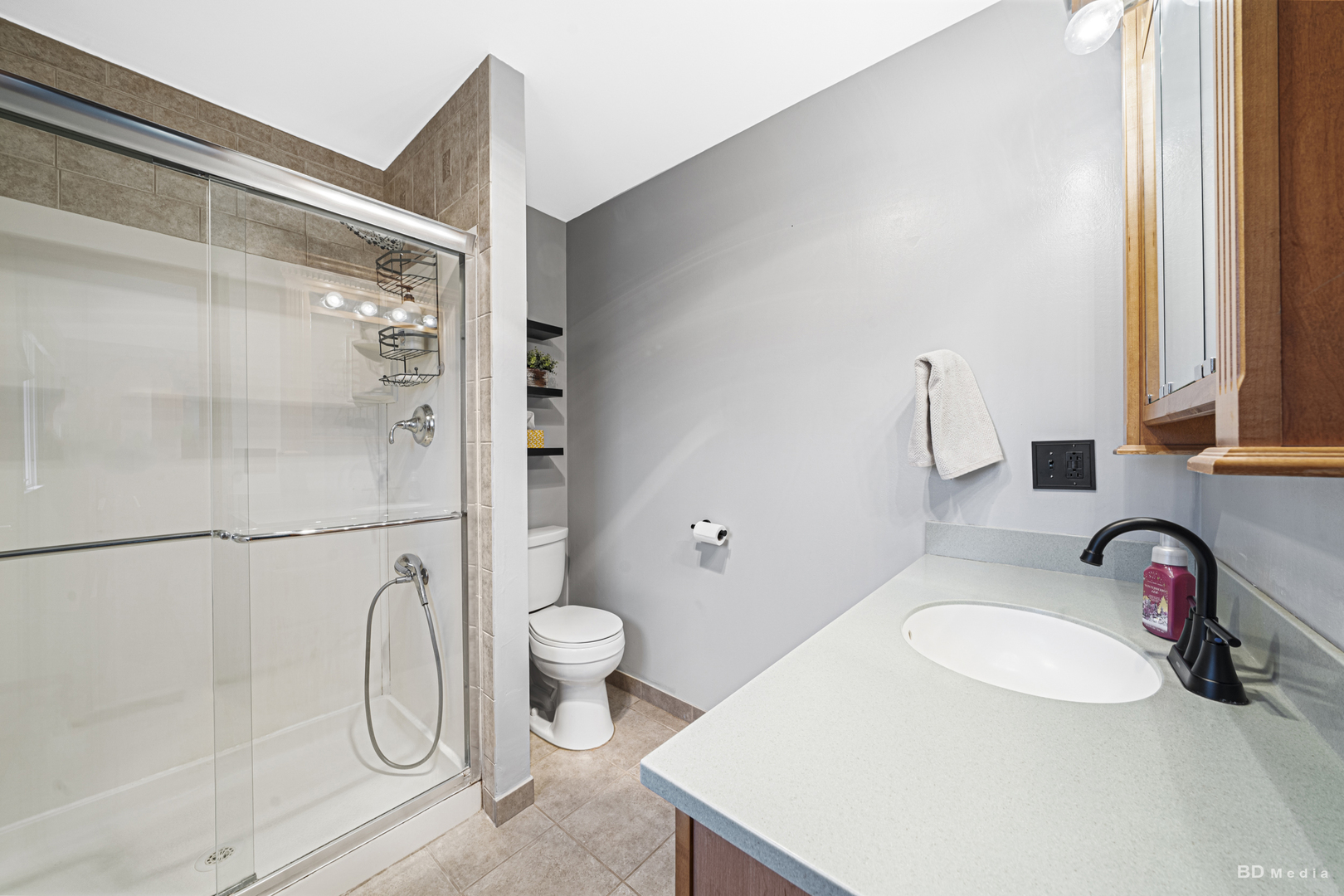 807 Maple Lane Peotone, IL 60468 - Photo 22 of 33 a bathroom with a sink toilet and shower