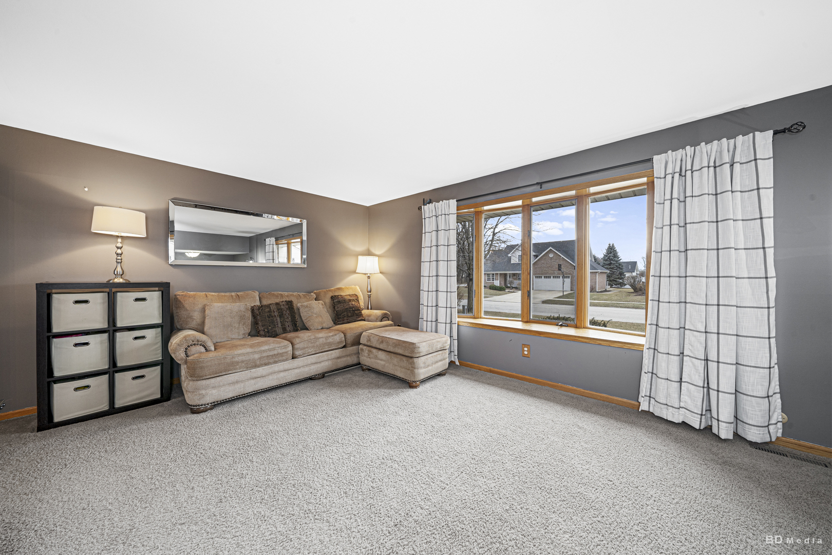 807 Maple Lane Peotone, IL 60468 - Photo 6 of 33 a living room with furniture and a large window